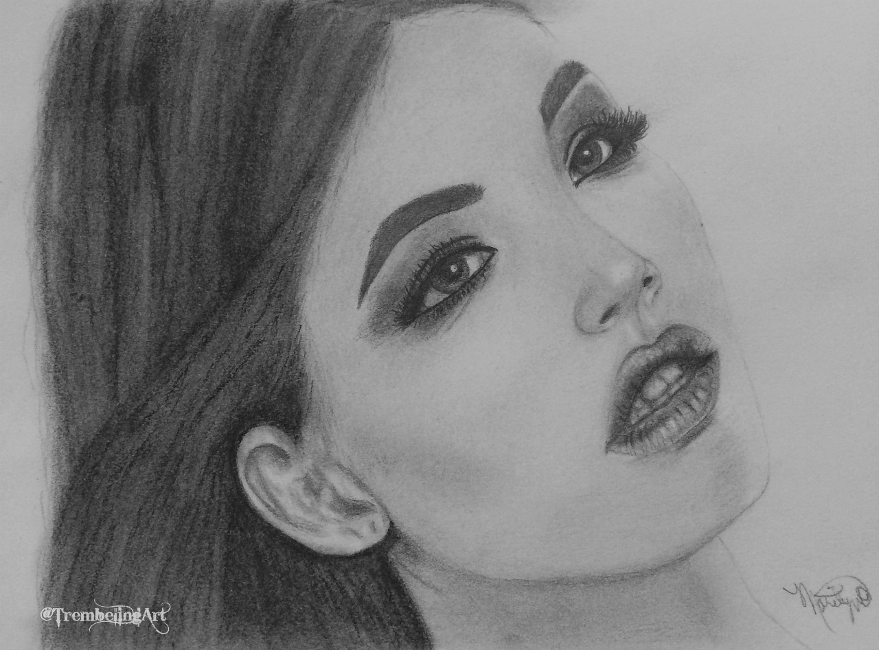 A graphite drawing of a girl with long hair.
