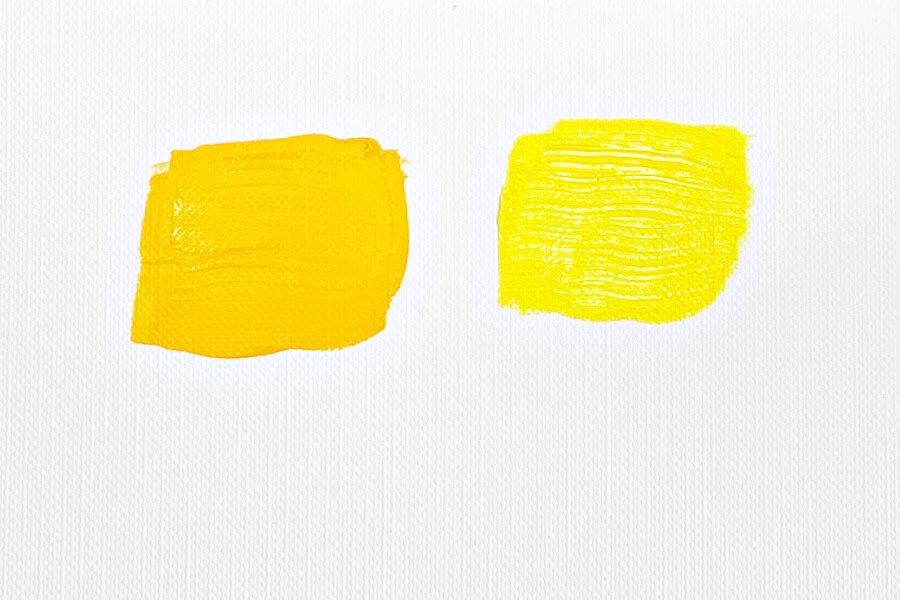 Two paint swatches showing a warm and cool yellow.